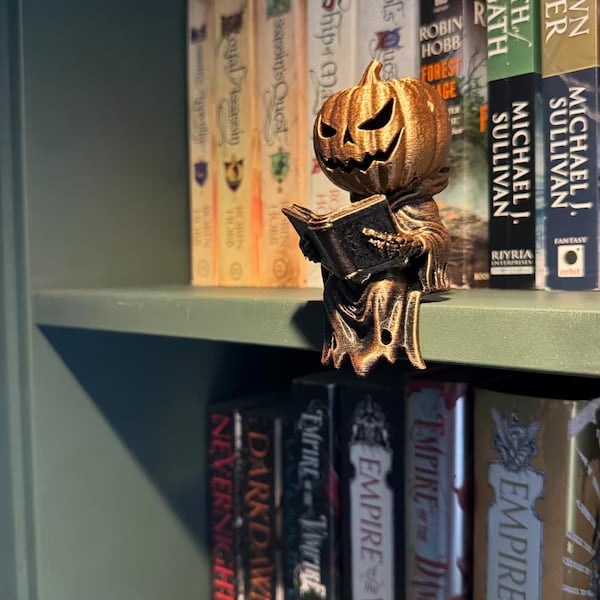 π Reading Pumpkin Shelf Sitter