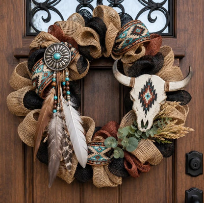 Bohemian-style cow skull and feather door knocker decoration