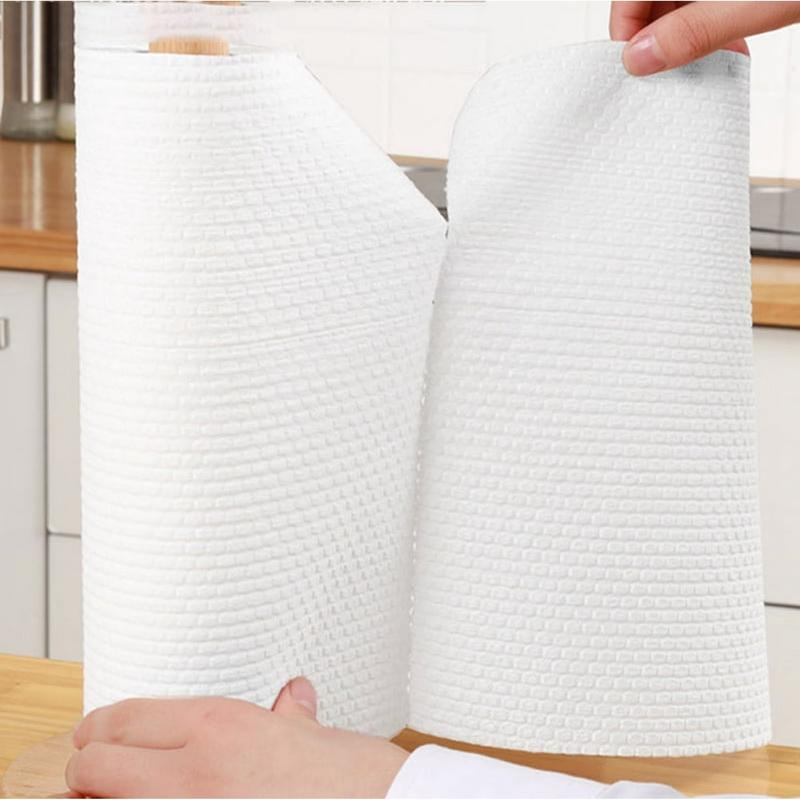 cleaning food and sauce from plate with kitchen towel