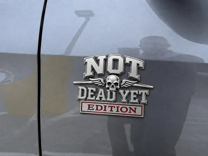 🔥Summer Hot Sale☠️Not Dead Yet Edition Car Emblem Metal Decorative Badge- Made in USA